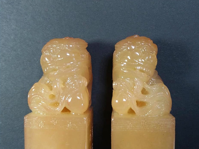 高山獅子戲球鈕對章