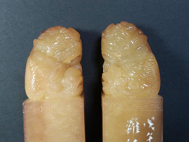 高山獅子戲球鈕對章
